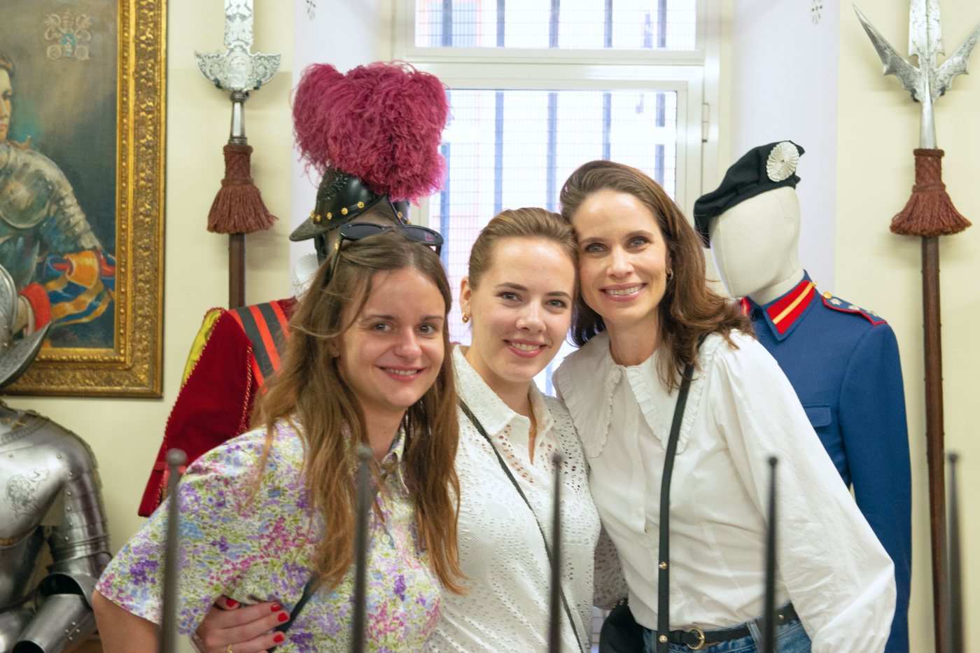 Kamila, Eleah and Chiara posing for a picture during a tour of the Swiss Guard Barracks.